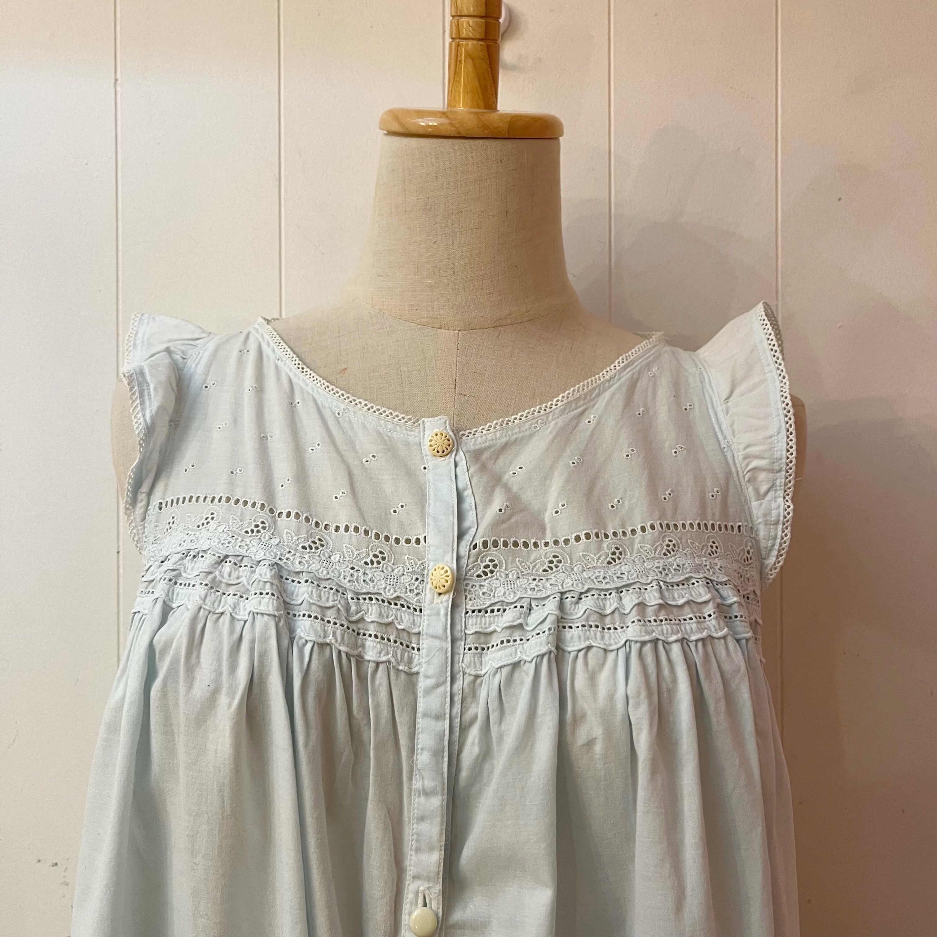 light blue sleeve less one-piece