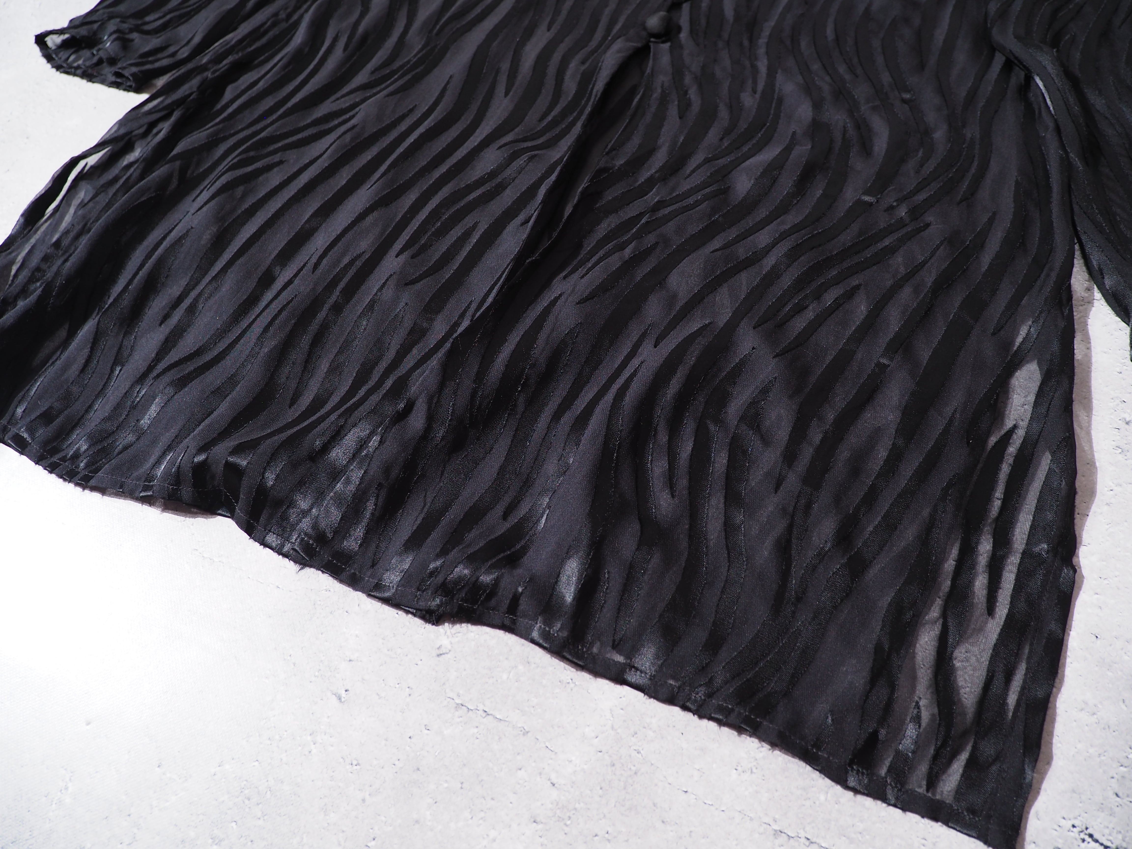 Black undulation tribal pattern loose sheer shirt