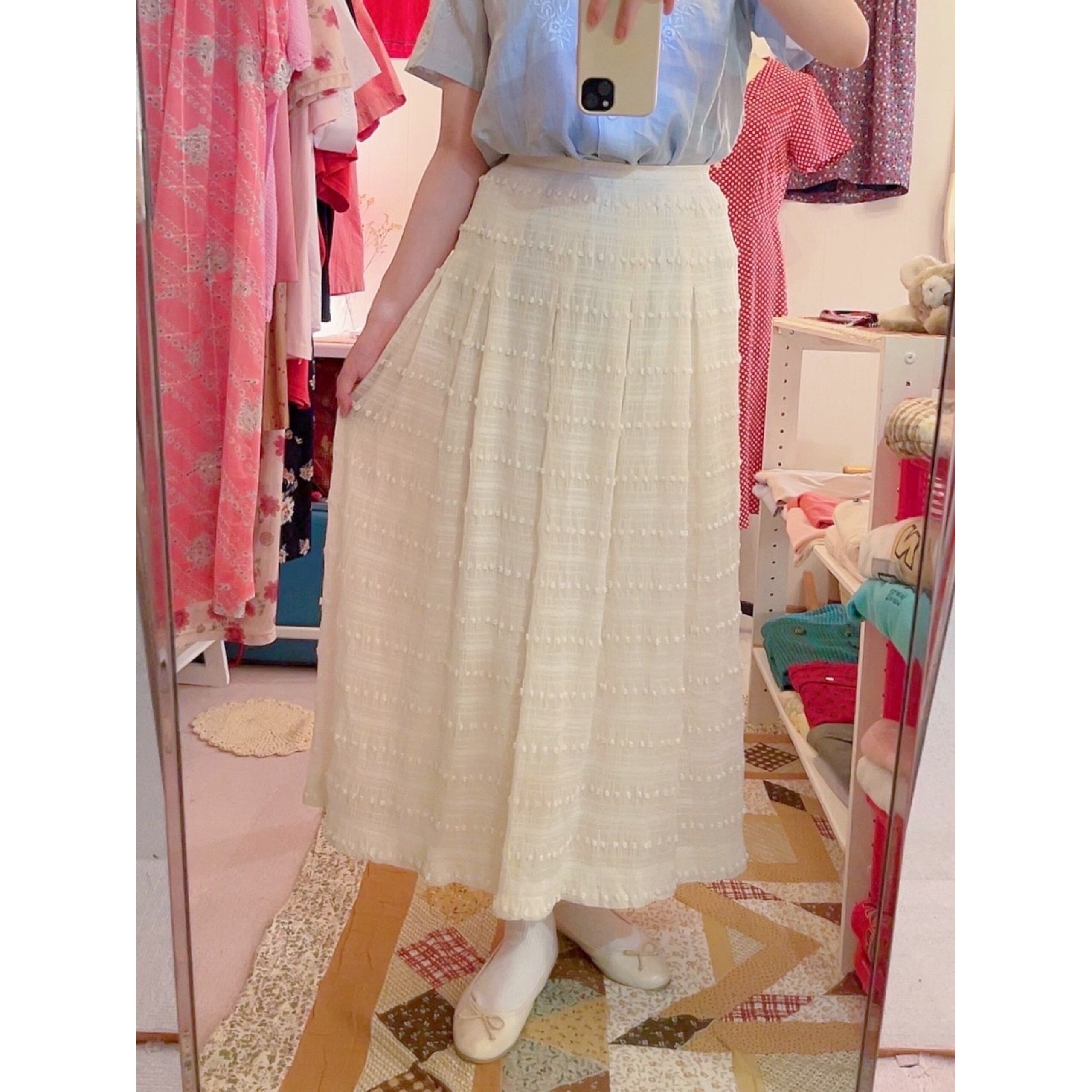 NINARICCI / mini ponpon white flare skirt