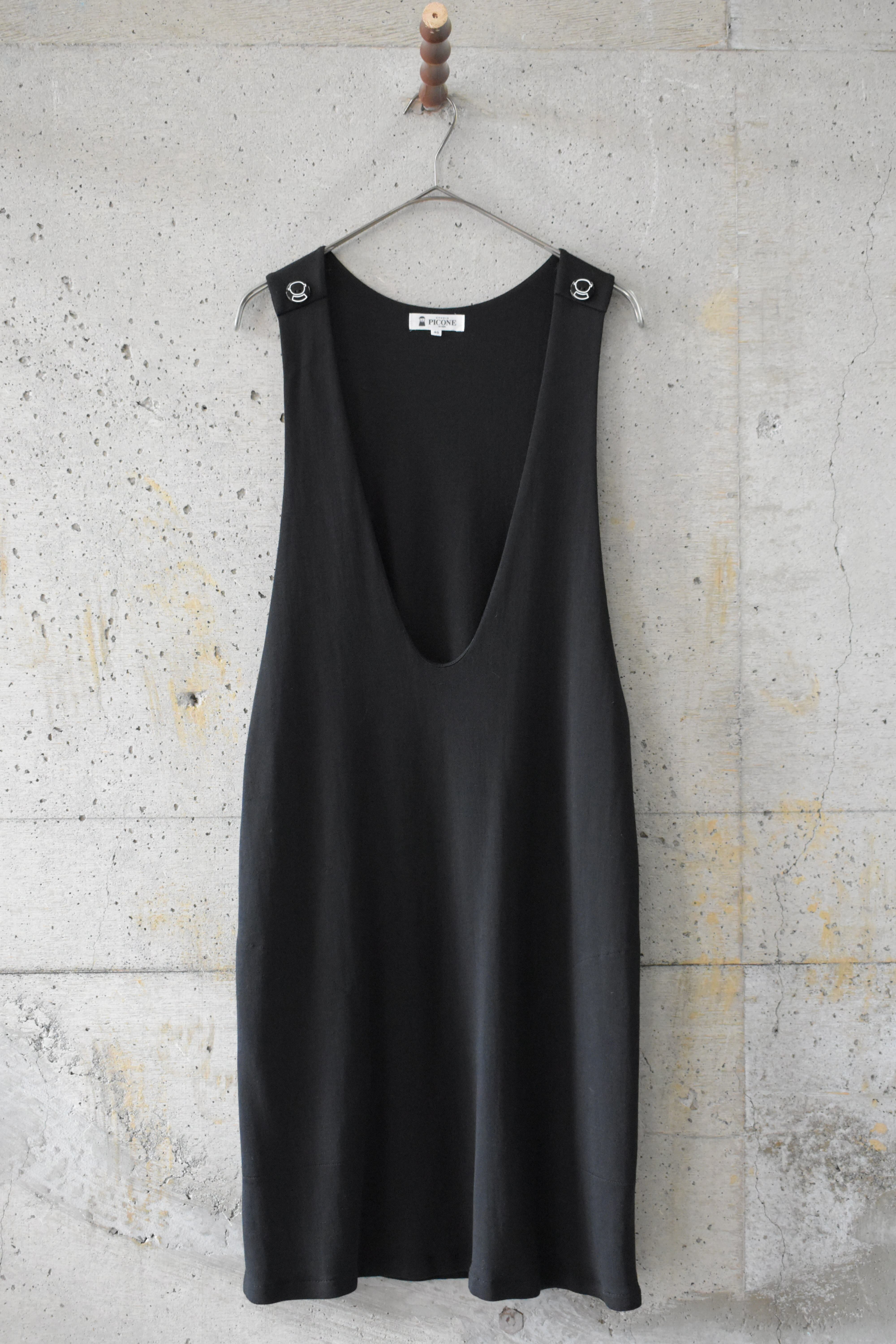 A dress with a wide neckline and armholes