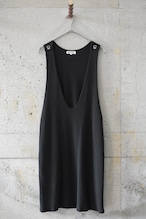 A dress with a wide neckline and armholes
