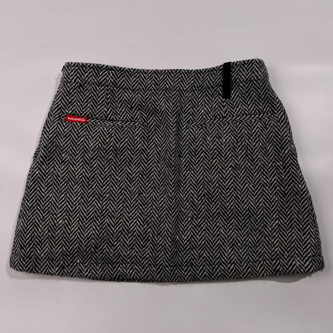 le coq sportif GOLF ルコックスポーツ ゴルフ ヘリンボーン ラップスカート 9/ブラック×ホワイト ウール混 レディース