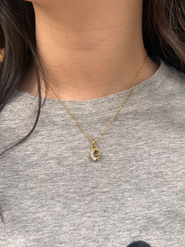 GIVENCHY / vintage G design half stone necklace.