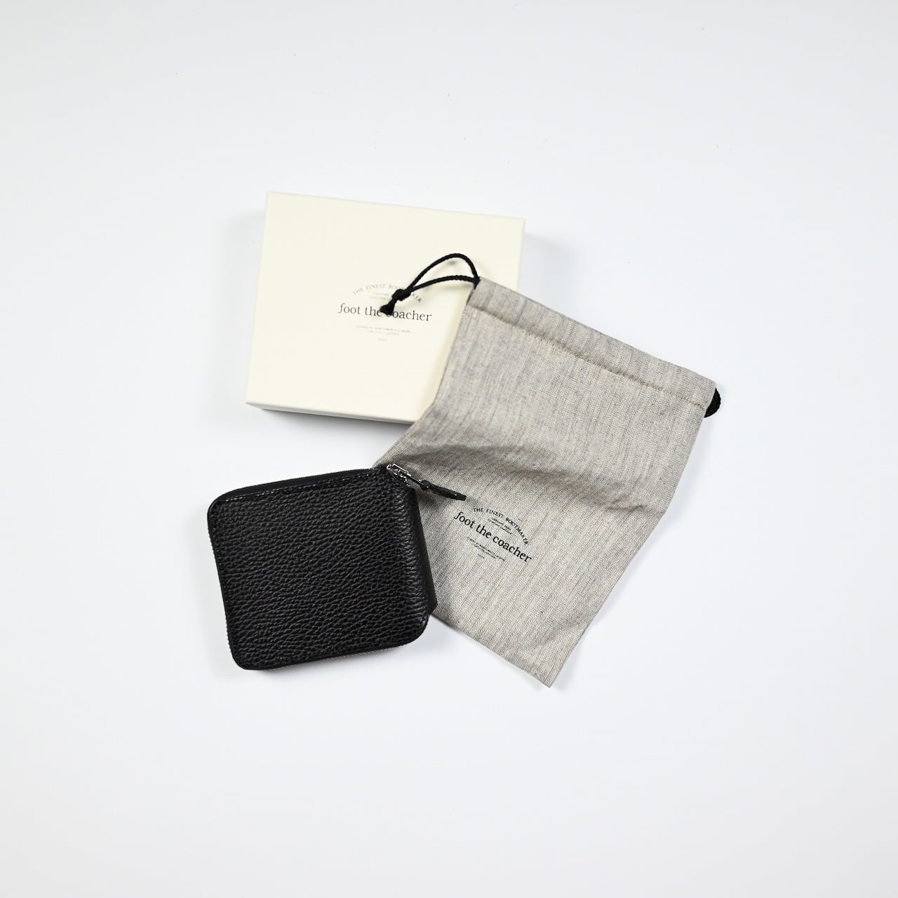 foot the coacher / SQUARE ZIP WALLET | GANKO