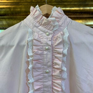 pink frill blouse with pearl buttons