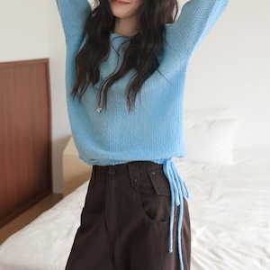 side drawstring knit sweater