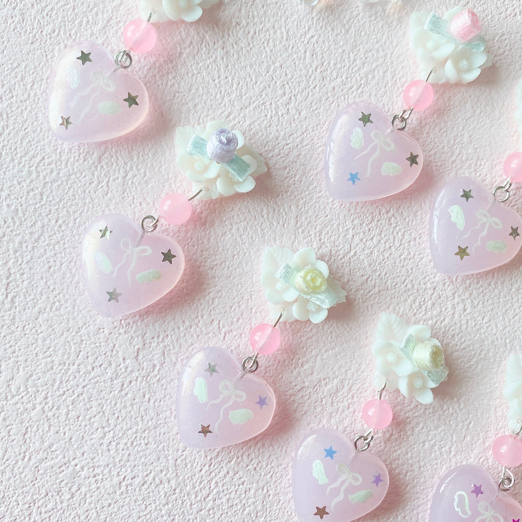 天然石× handpaint 羽とりぼん꙳耳飾り (blue)