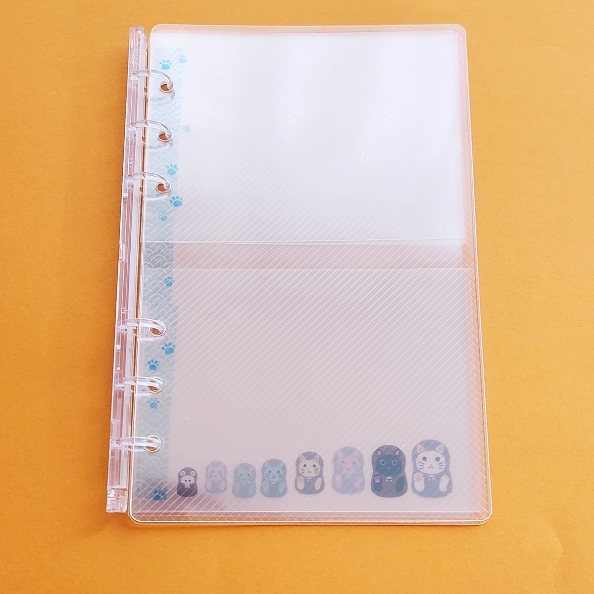 シール帳【手帳サイズ】6穴　ニャンリョーシカ