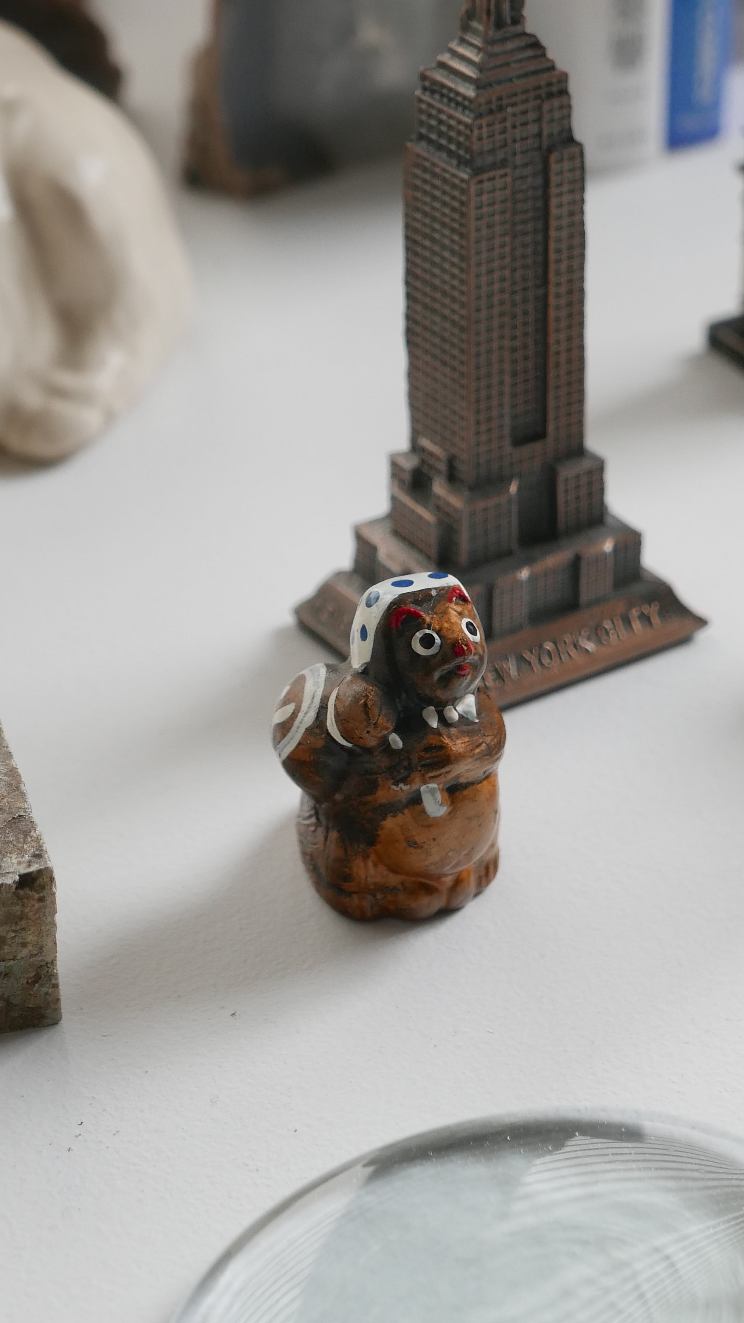 small tanuki object , gold brown