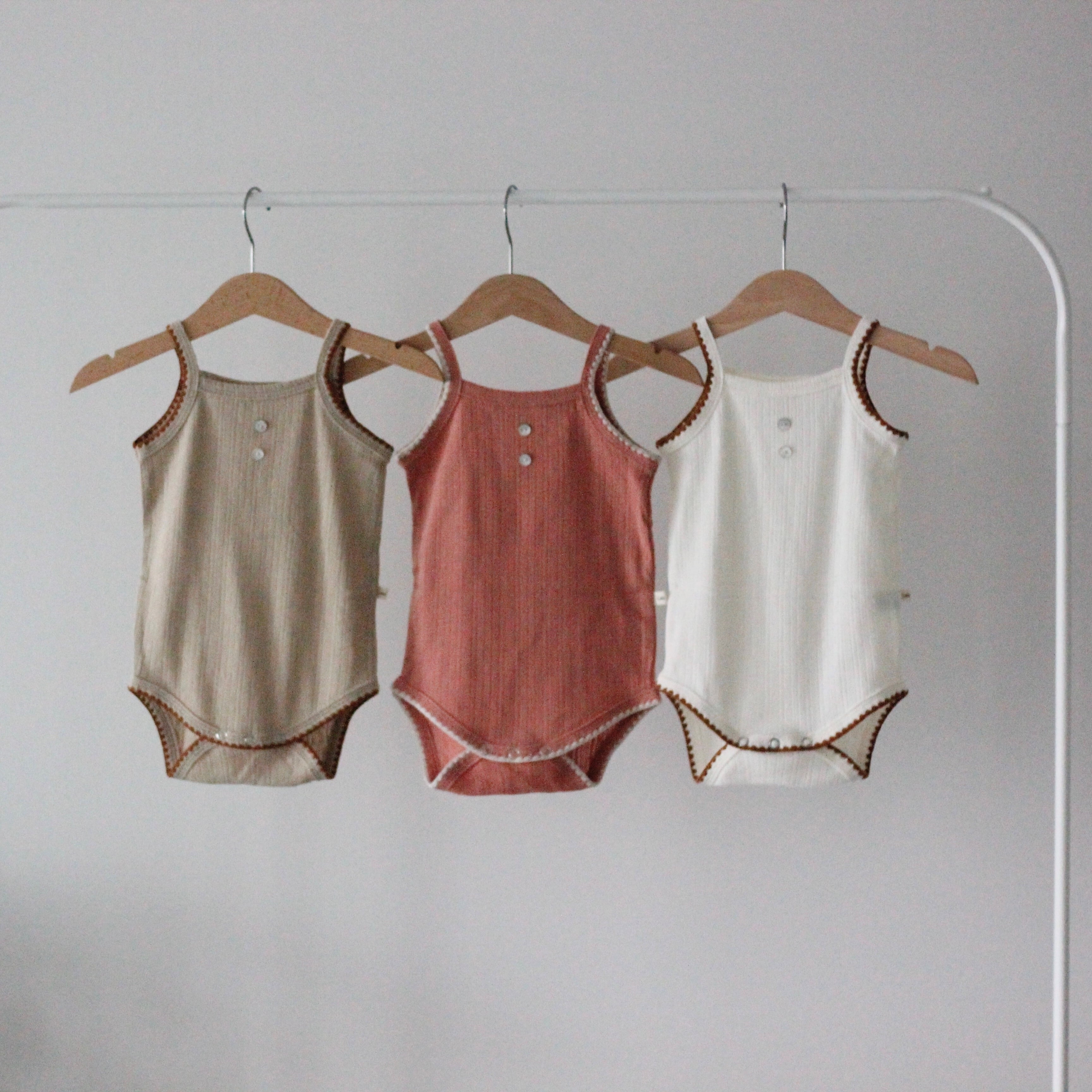 piping stitch rompers