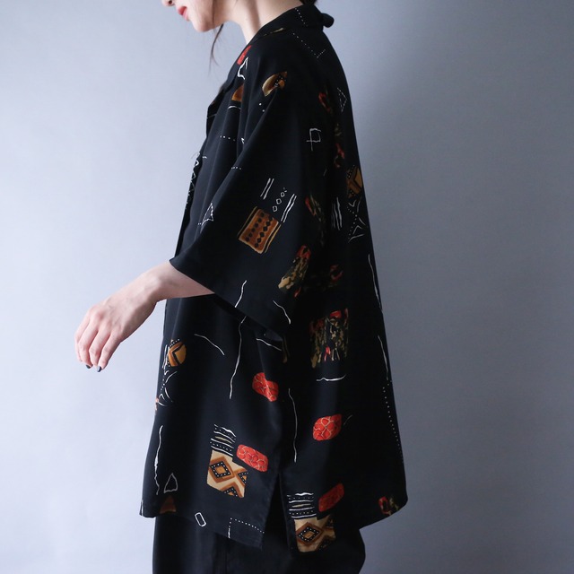 geometry art graphic pattern XXX over silhouette open collar h/s shirt