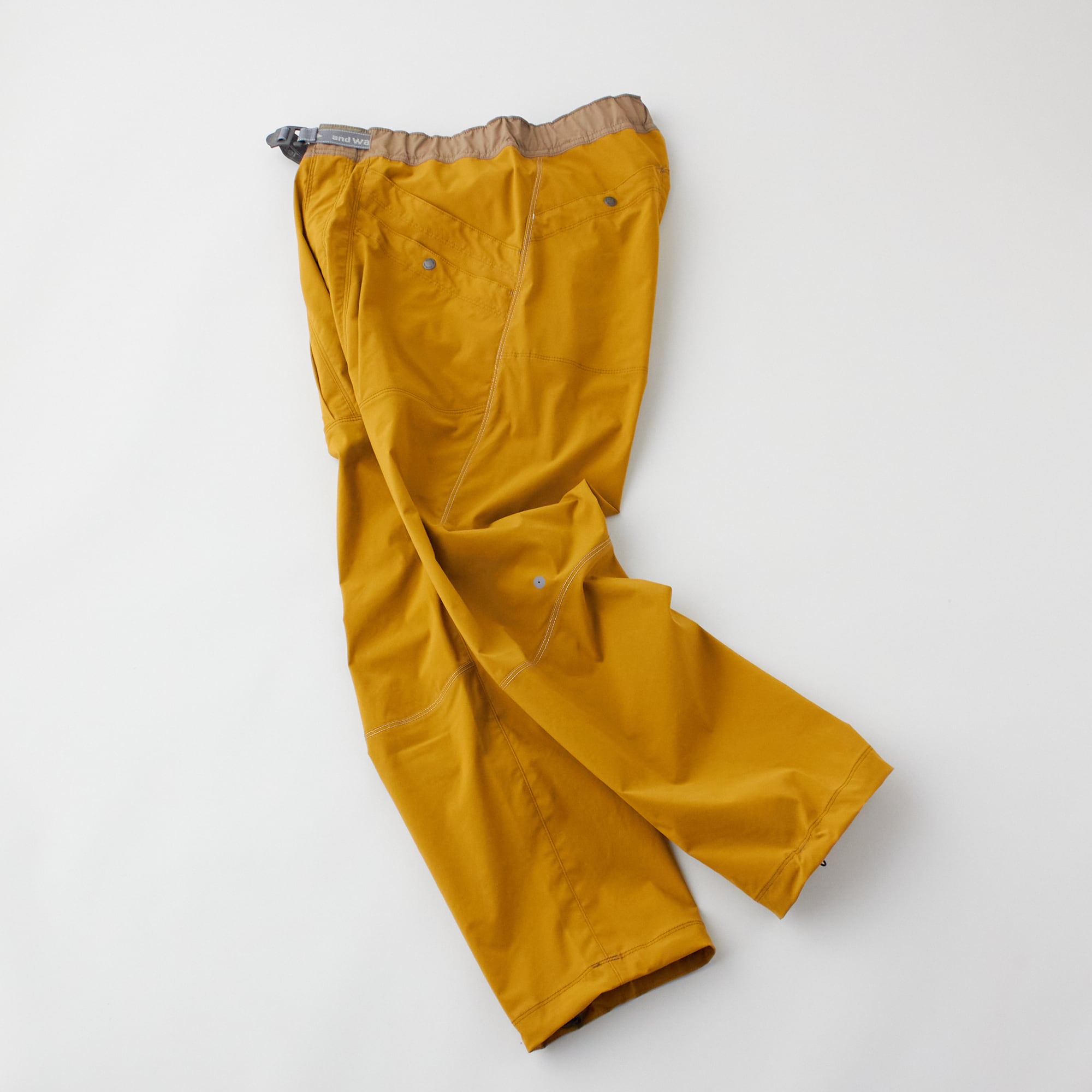 and wander(アンド・ワンダー)pocket stretch pants camel 190 メンズ・ウィメンズパンツ | unite(ユニテ  ）