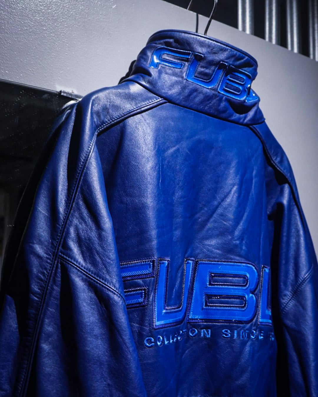 add (C) vintage】“FUBU” Vivid Blue Loose Leather Jacket | Caka
