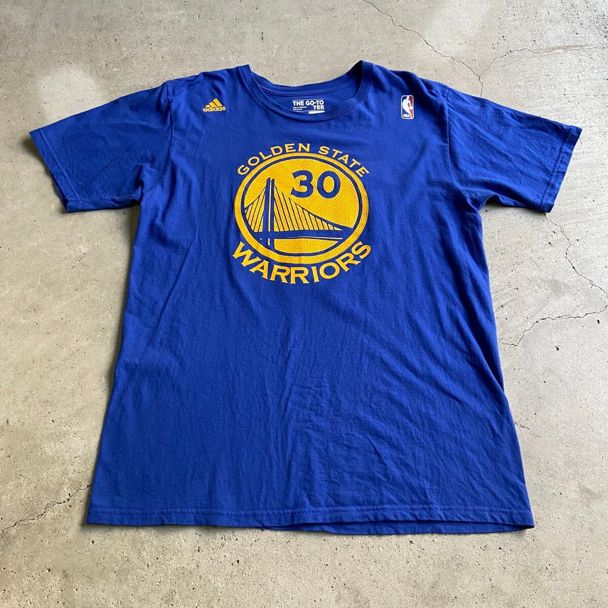 adidas アディダス NBA ゴールデンステート・ウォリアーズ Golden State Warriors プリントTシャツ メンズL 古着  チーム ブルー 青色【Tシャツ】【PD20】【FSS2308-50b】 | cave 古着屋【公式】古着通販サイト