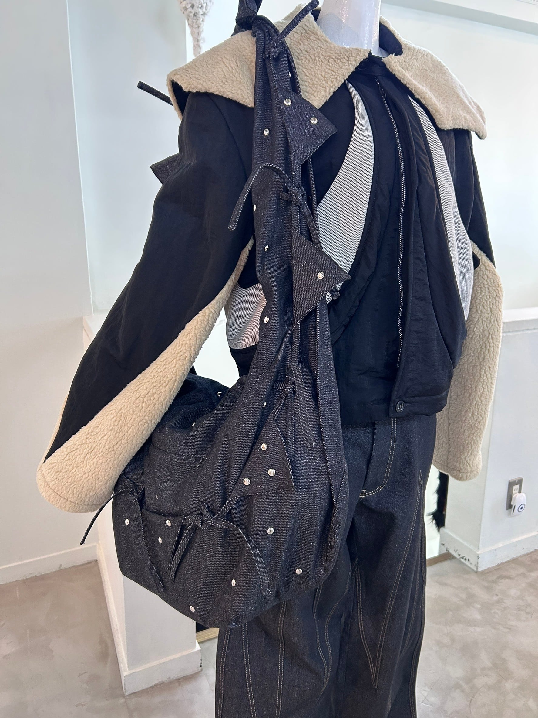 STRONGTHE studded talisman bag / charcoal denim