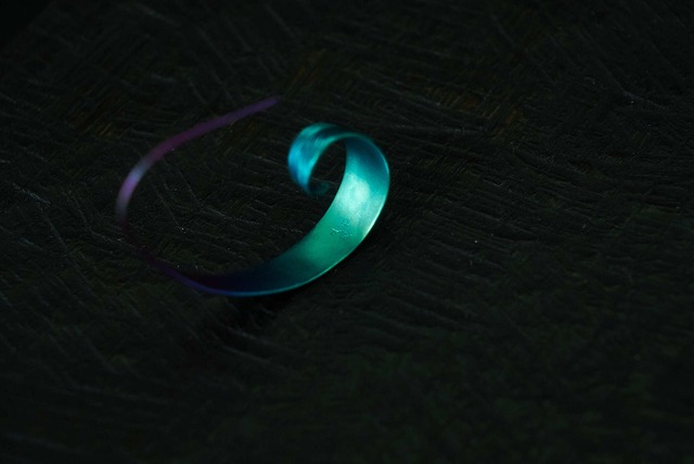 カールフェザーピアス  M size