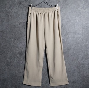 Light beige easy flare slacks pants