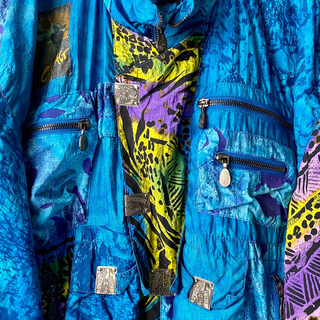 old multi pattern nylon pullover