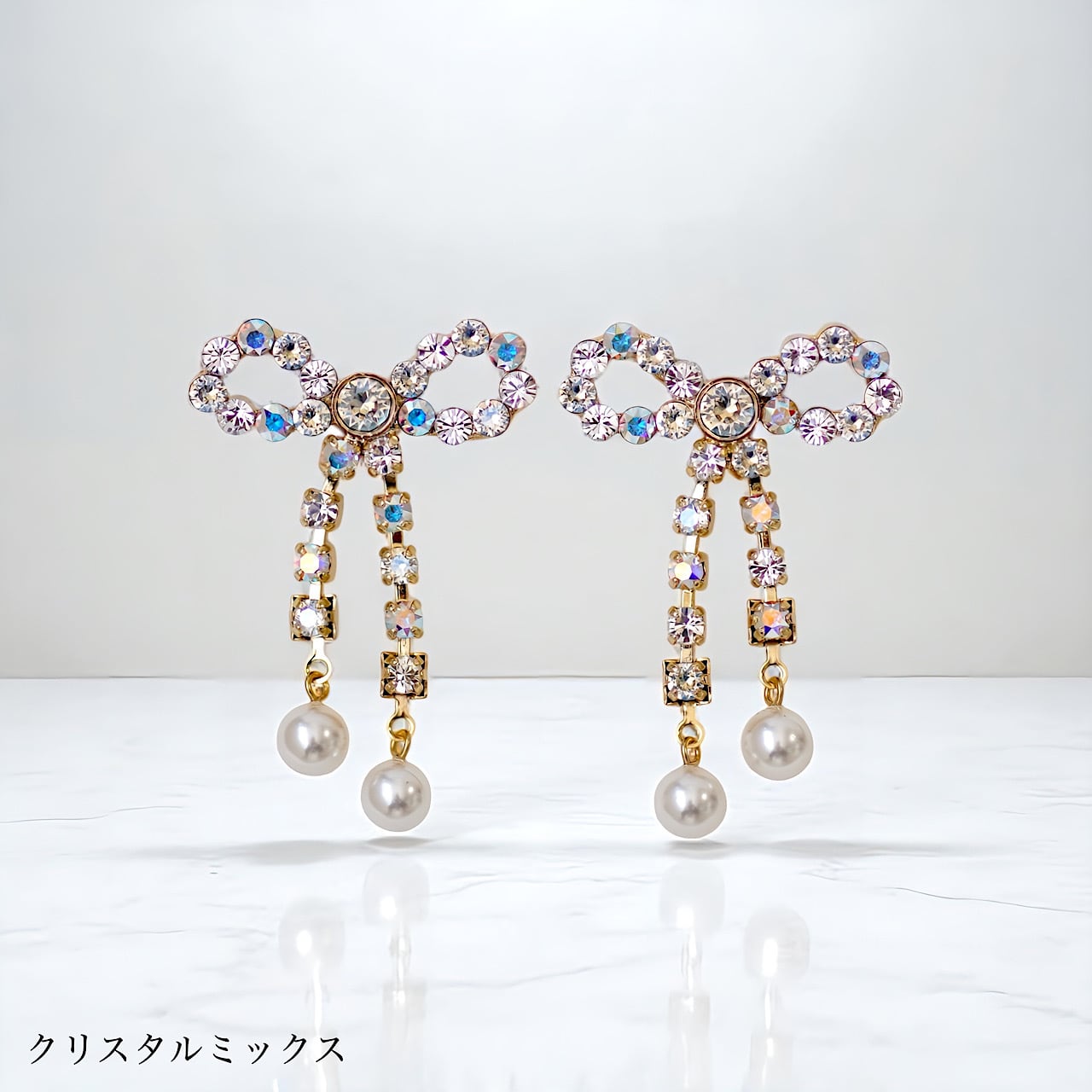 パールリボン ピアス | MAKI NUMOTO (マキ ヌモト