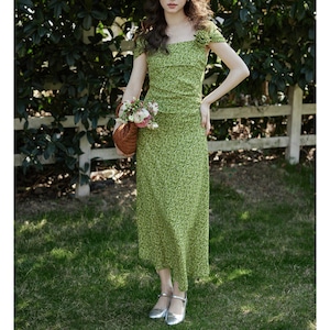 green colored floral half sleeved dress