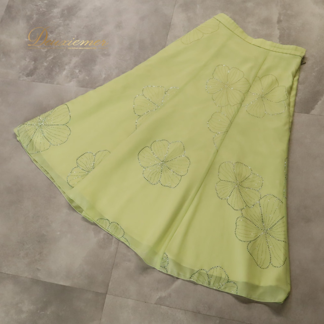 社交ダンス 衣装 U:NA ユーナ スカート レッスンウェア イエロー系 レモンイエロー 黄 花柄 キラキラ フレアスカート 軽やか 明るい かわいい おしゃれ 上品 大人っぽい 透け感 シースルー ダンス 練習 レッスン ダンス衣装 練習着 社交ダンス衣装