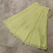 社交ダンス 衣装 U:NA ユーナ スカート レッスンウェア イエロー系 レモンイエロー 黄 花柄 キラキラ フレアスカート 軽やか 明るい かわいい おしゃれ 上品 大人っぽい 透け感 シースルー ダンス 練習 レッスン ダンス衣装 練習着 社交ダンス衣装