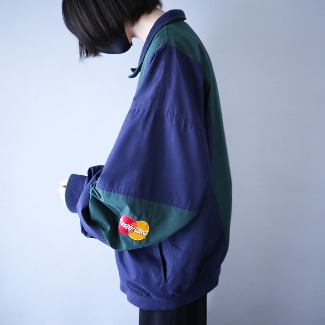 "Master Card" green × navy bi-color switching half-zip pullover