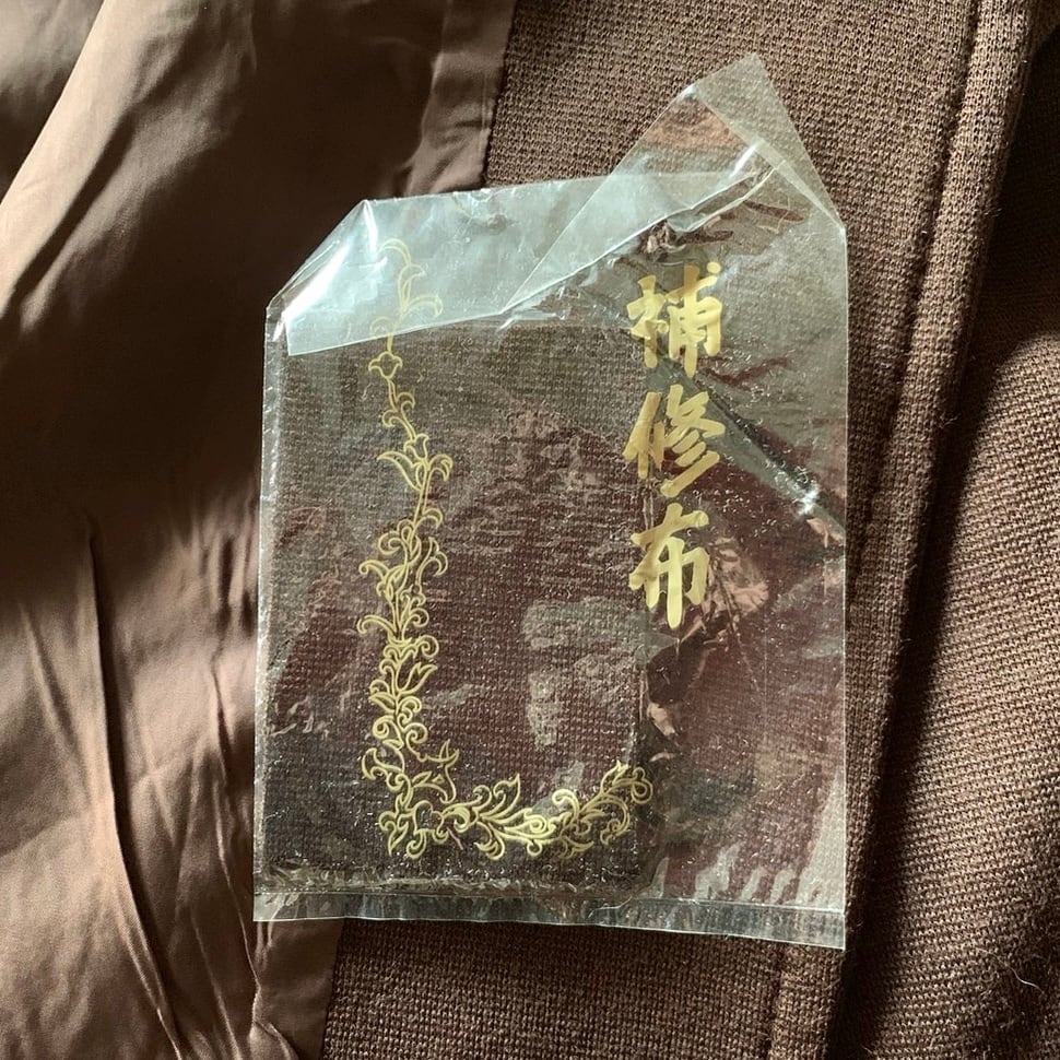 レトロなベルト付きダークブラウンコート | コルビジェ