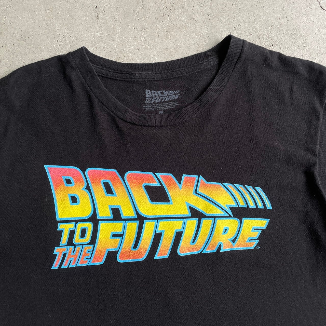 BACK TO THE FUTURE バックトゥザフューチャー ムービー ロゴ プリントTシャツ メンズM 古着 映画 ブラック 黒  【Tシャツ】【FSS2308-50b】 | cave 古着屋【公式】古着通販サイト