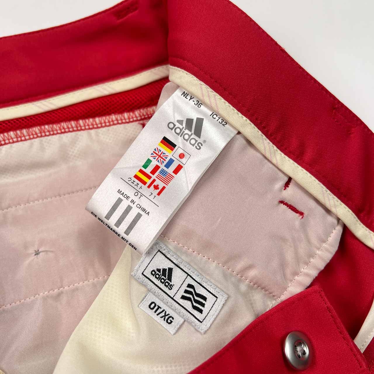 美品 adidas GOLF アディダス ゴルフ 裾フレア スラックスパンツ サイズ OT /レッド系