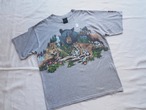 1996's USA A zoo T-shirt with lots of animals printed on it.