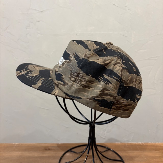 THE NEXT LOCATION CAP CAMO