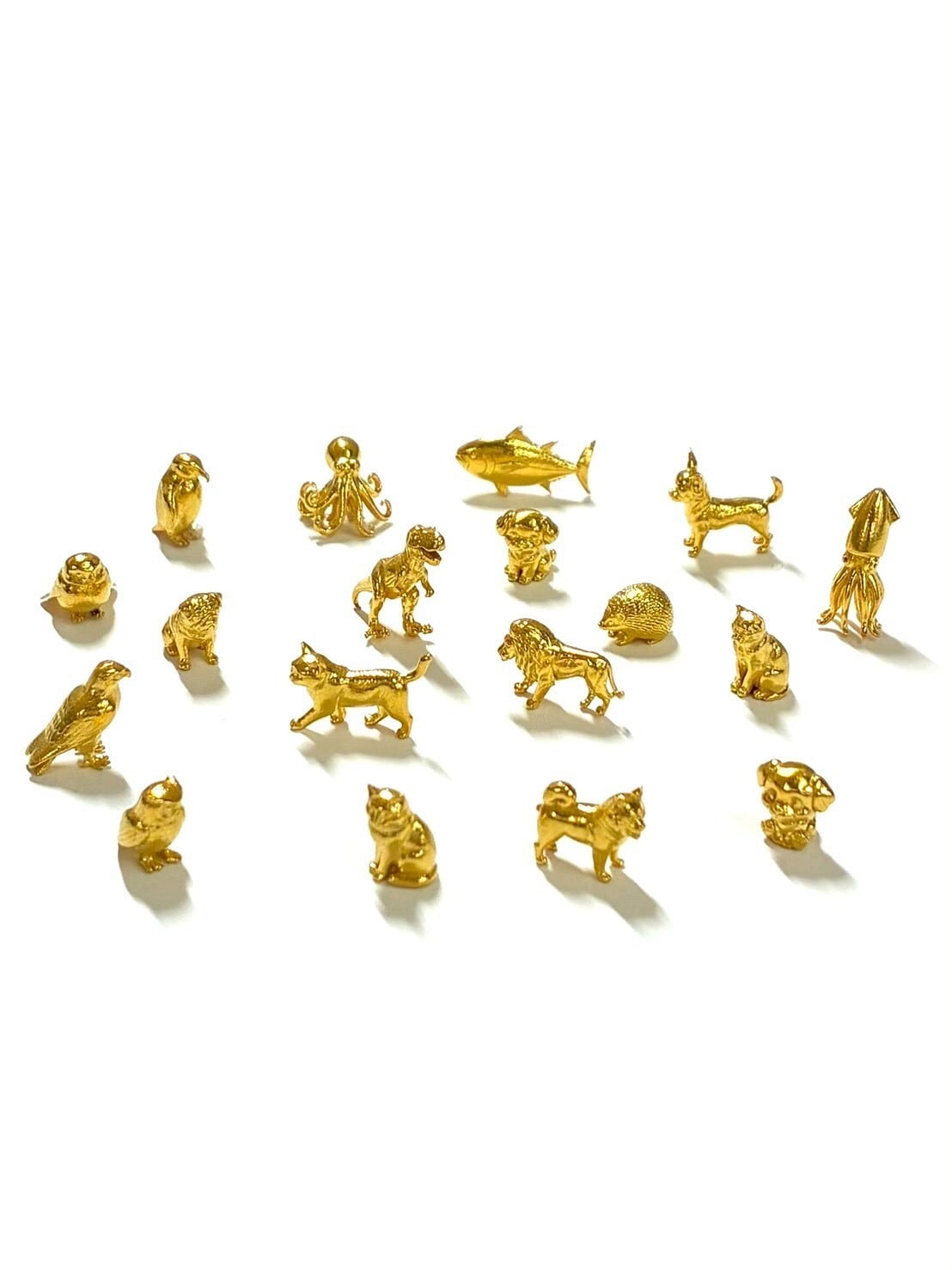 純金のイカ 1グラム JUNGOLD 指先サイズの芸術品 額縁ケース付き