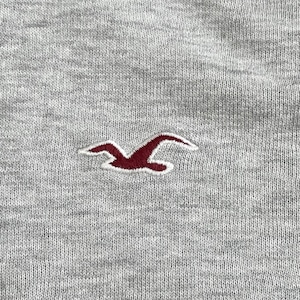 【HOLLISTER】ワンポイント 刺繍ロゴ パーカー プルオーバー フーディー スウェット ラグランスリーブ 切替 S ホリスター US古着