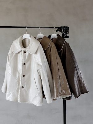 reversible patchwork mouton coat