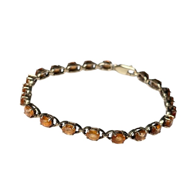 vintage 9ct gold tennis bracelet set with orange sapphire
