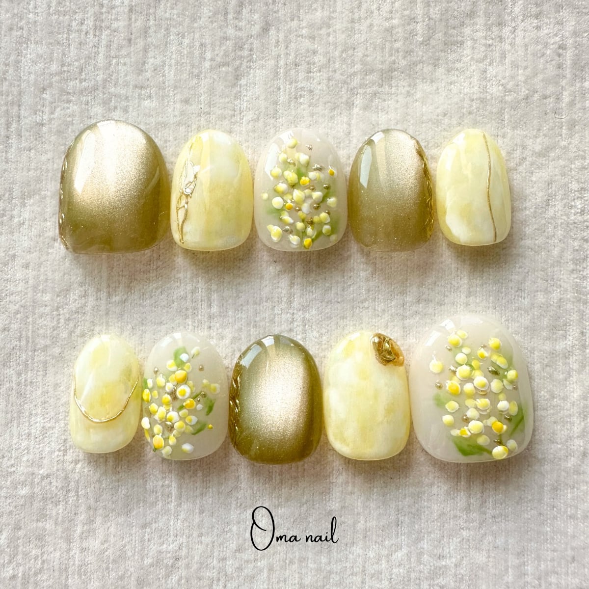 春感じるミモザネイル