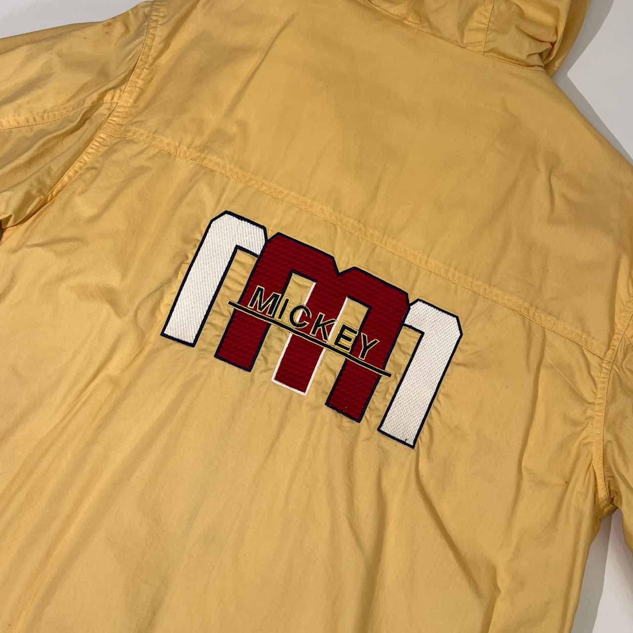 THE DISNEY STORE ディズニー ミッキー刺繍入り フード付き コート ジャケット M /イエロー/コットン