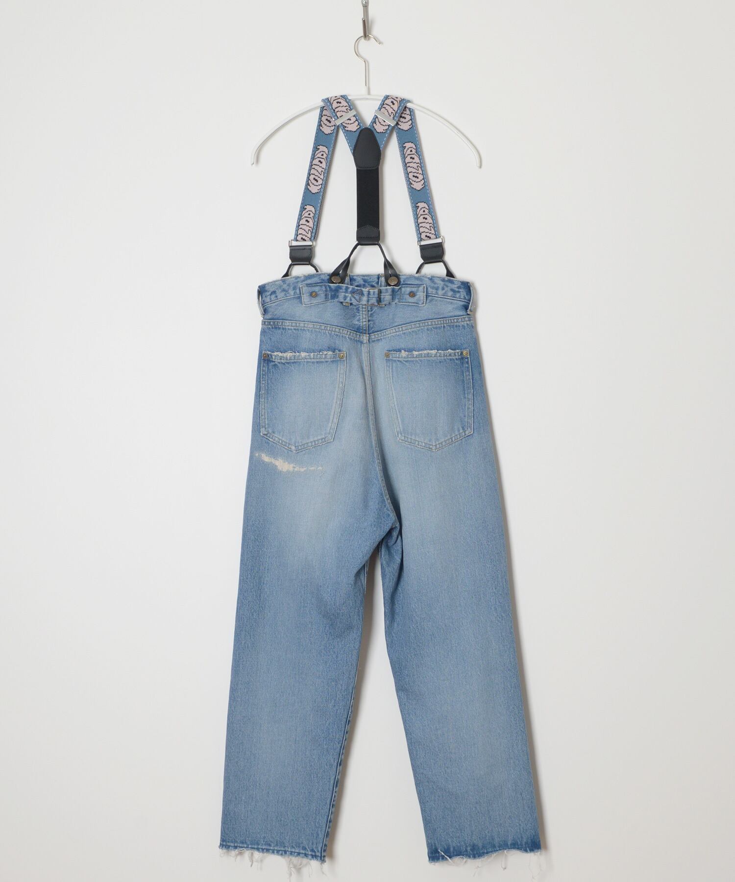 HOLIDAY DAMAGE DENIM SUSPENDER PANTS | swirl