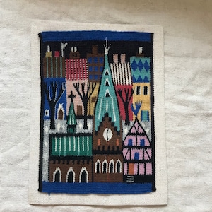 カラフルな建物の織物