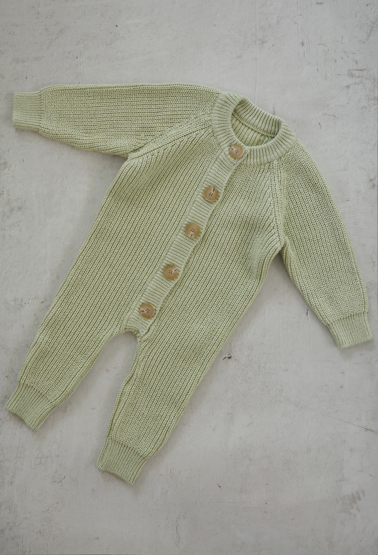 【AW26ご予約】EARTH THE ARCHIVE / Button knit jumpsuit