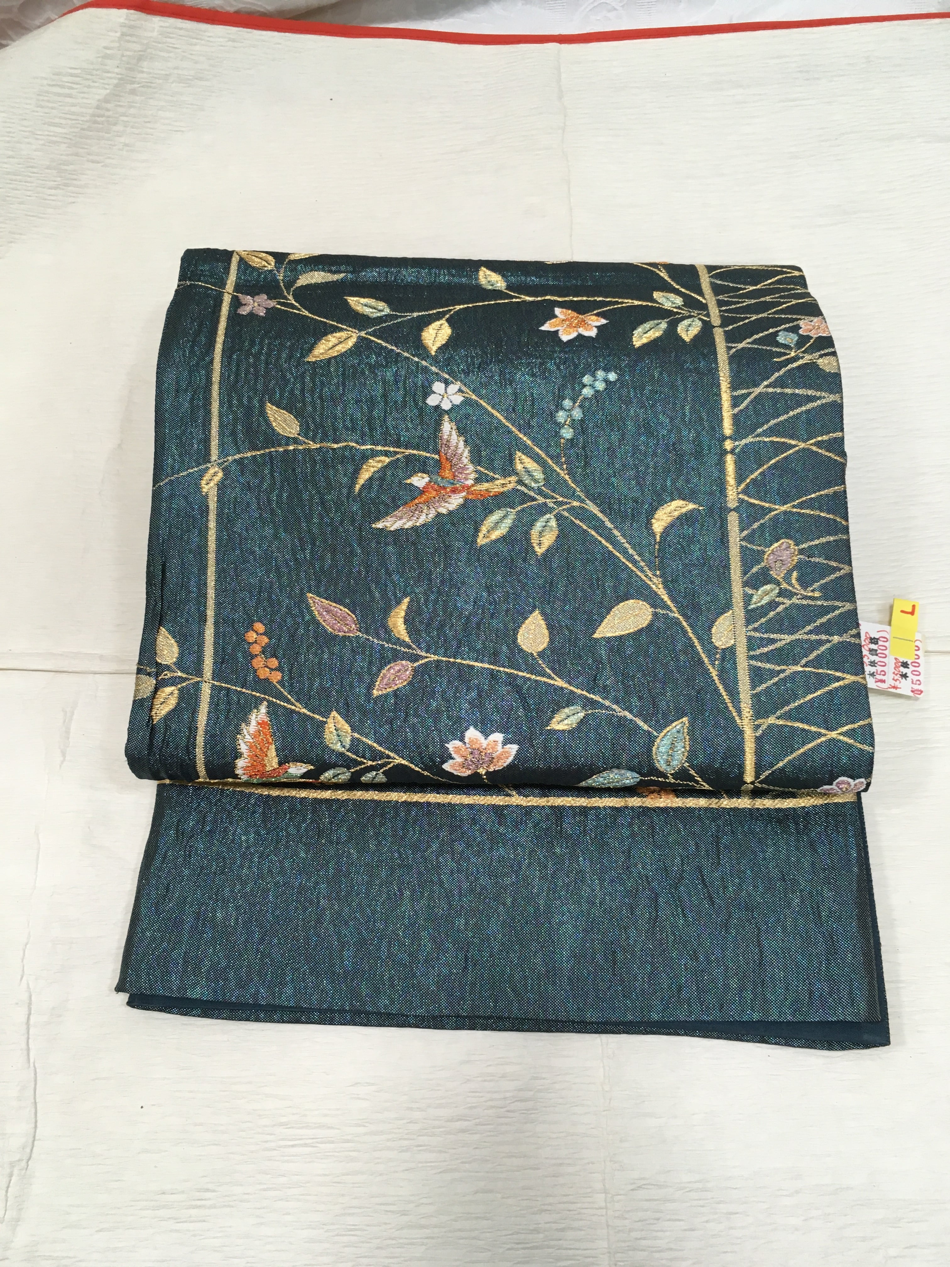 袋帯（ラメ入青緑地枝に花）