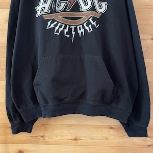 【AC/DC】HIGH VOLTAGE バンド 音楽 ロゴ プリント パーカー スウェット プルオーバー フーディー X-LARGE ビッグサイズ US古着