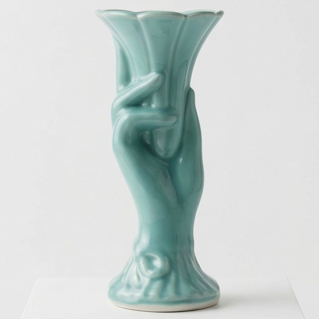 Blue hand vase