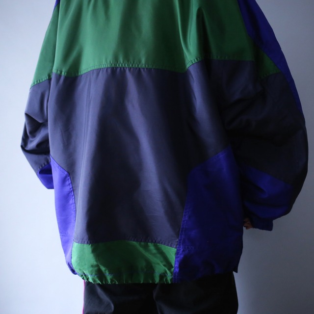 psychedelic multi coloring over silhouette tech half-zip pullover
