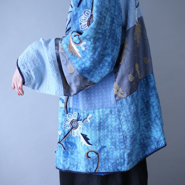 beautiful blue color flower embroidery design over silhouette gobelins jacket