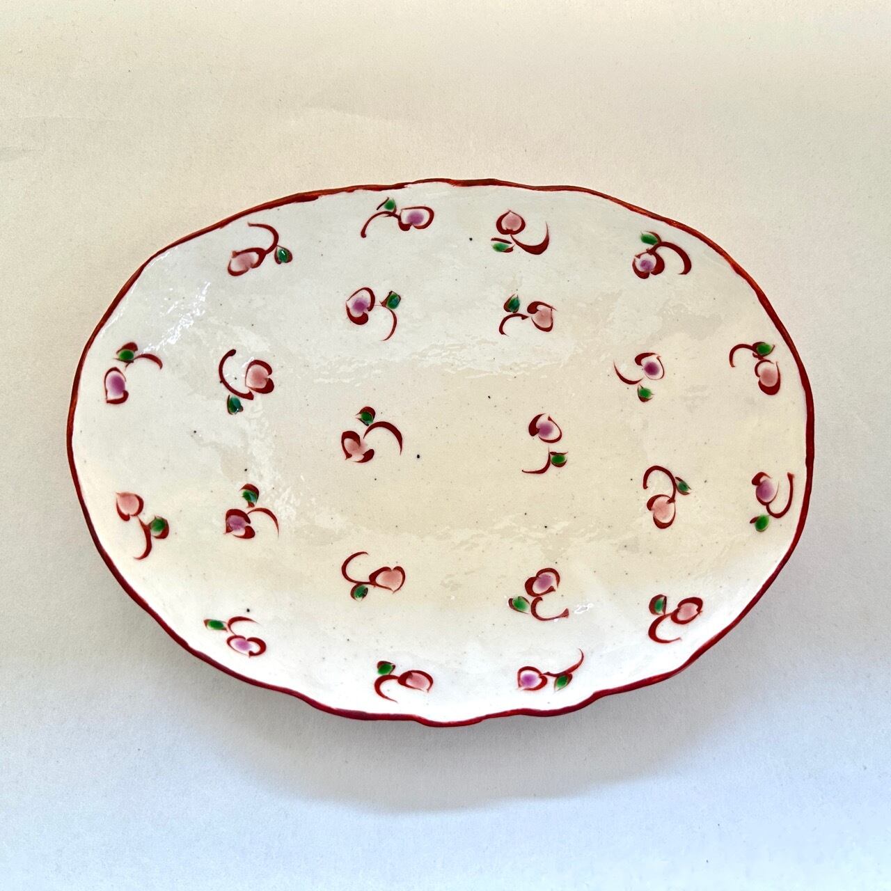 志野赤絵朱巻点花七寸楕円鉢【榛澤宏】