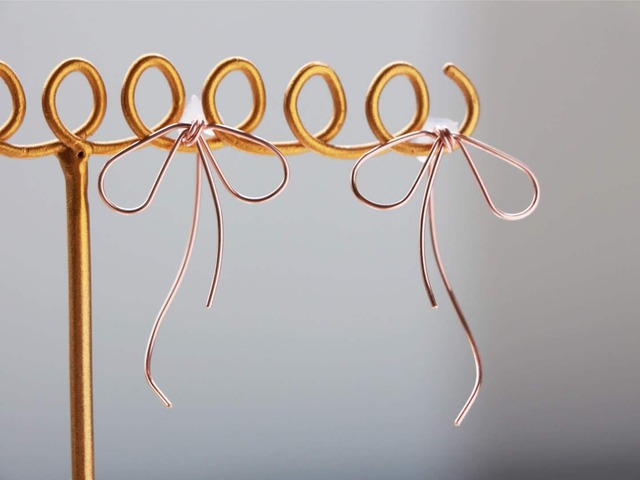 14kgf-Rose gold filled asymmetry ribbon pierced earrings