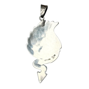 Hopi Ruben Saufkie textured silver overlay pendant “water dragon”