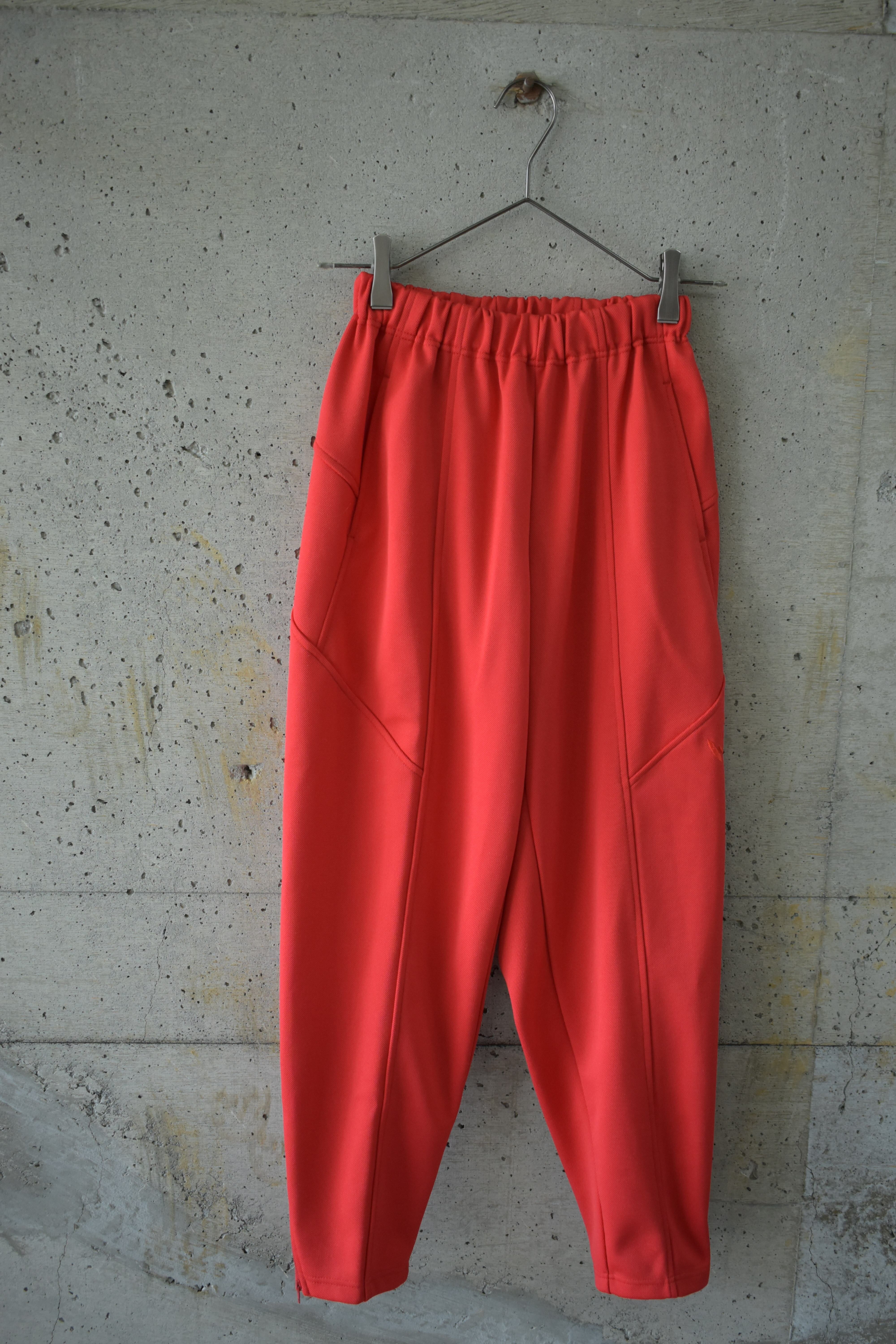 Red track pants